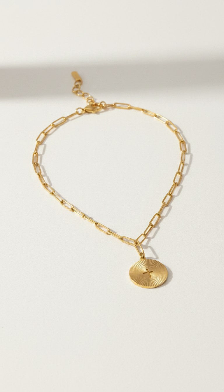 KM Jewelry Co. gold sunburst cross pendant necklace with paperclip chain, 18K gold PVD stainless steel.