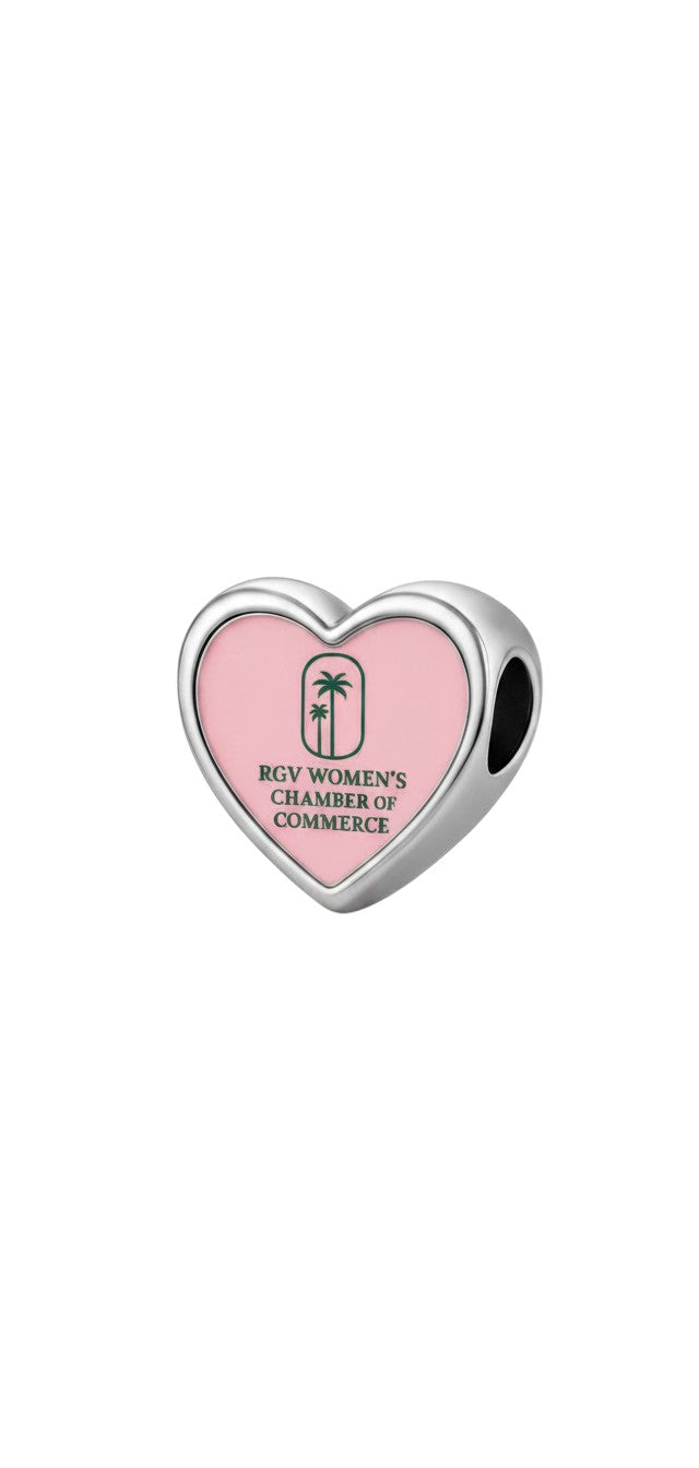 KM Jewelry Co. sterling silver heart charm with pink enamel and RGV Women's Chamber of Commerce logo featuring palm trees.