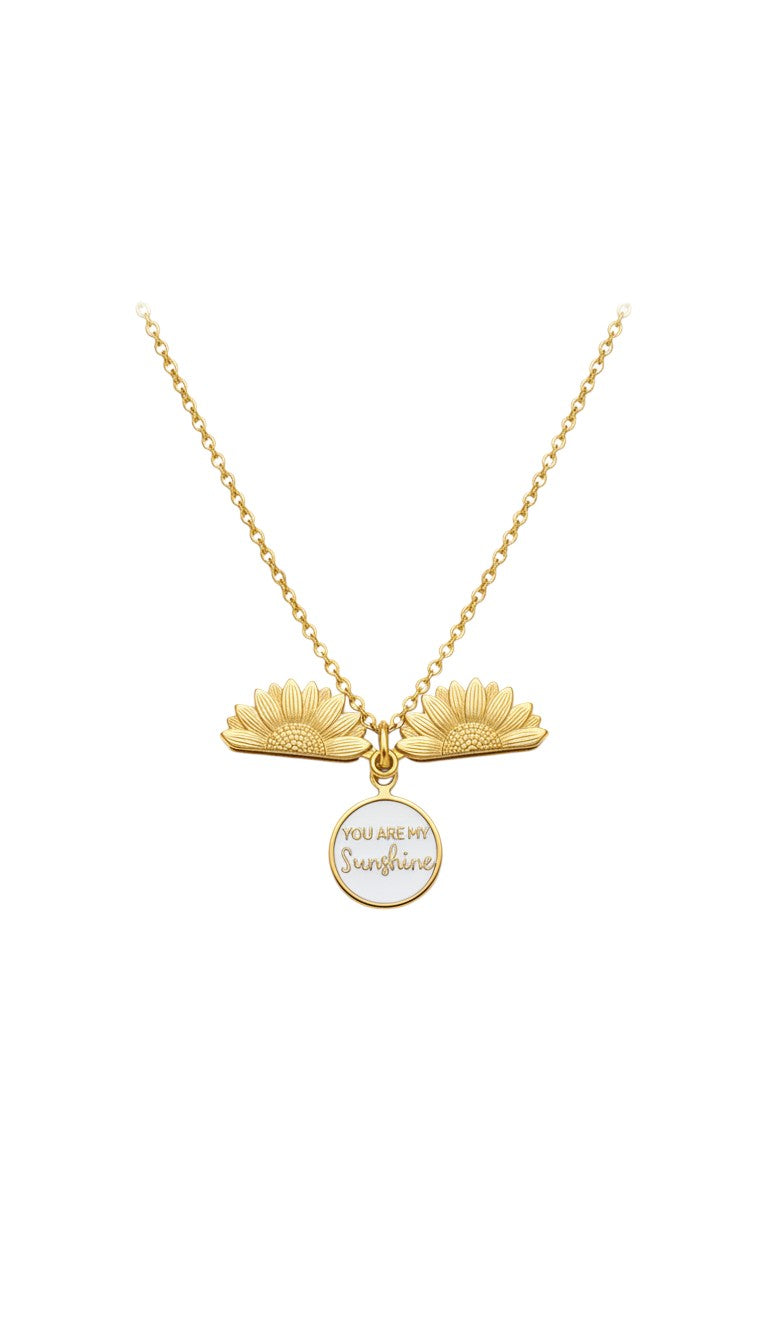 KM Jewelry Co. 18K PVD gold necklace with a round pendant that says "You Are My Sunshine" and two sunflower charms.